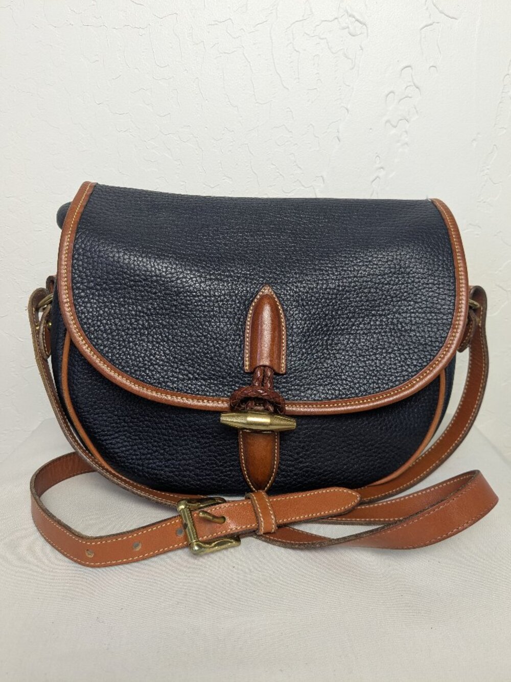 Vintage Dooney Bourke AWL Equestrian Saddle Bag Navy Tan Brass Toggle USA 80s